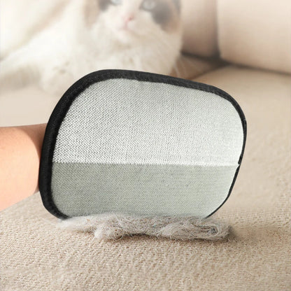 Grooming glove removing pet hair from sofa