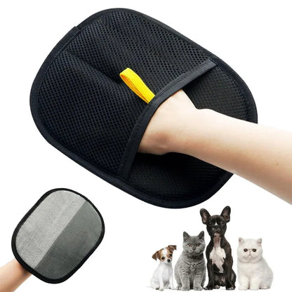 Pet grooming glove removing fur from dog coat